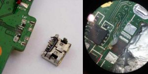Вид поврежденных контактных площадок разъема зарядки на телефоне Lenovo и оторванного usb разъема